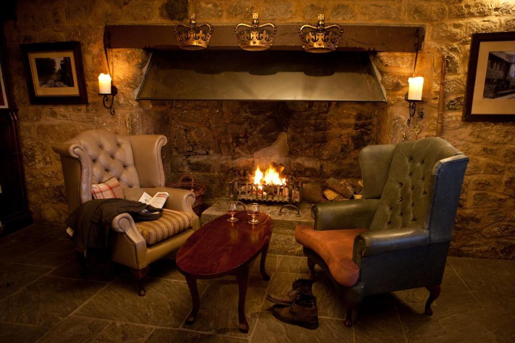 Hotel The Three Crowns Chagford Exterior foto The fireplace in the bar
